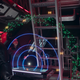 Three Rocinante crew members stare at a projected map showing a mysterious ship's flight path on The Expanse.